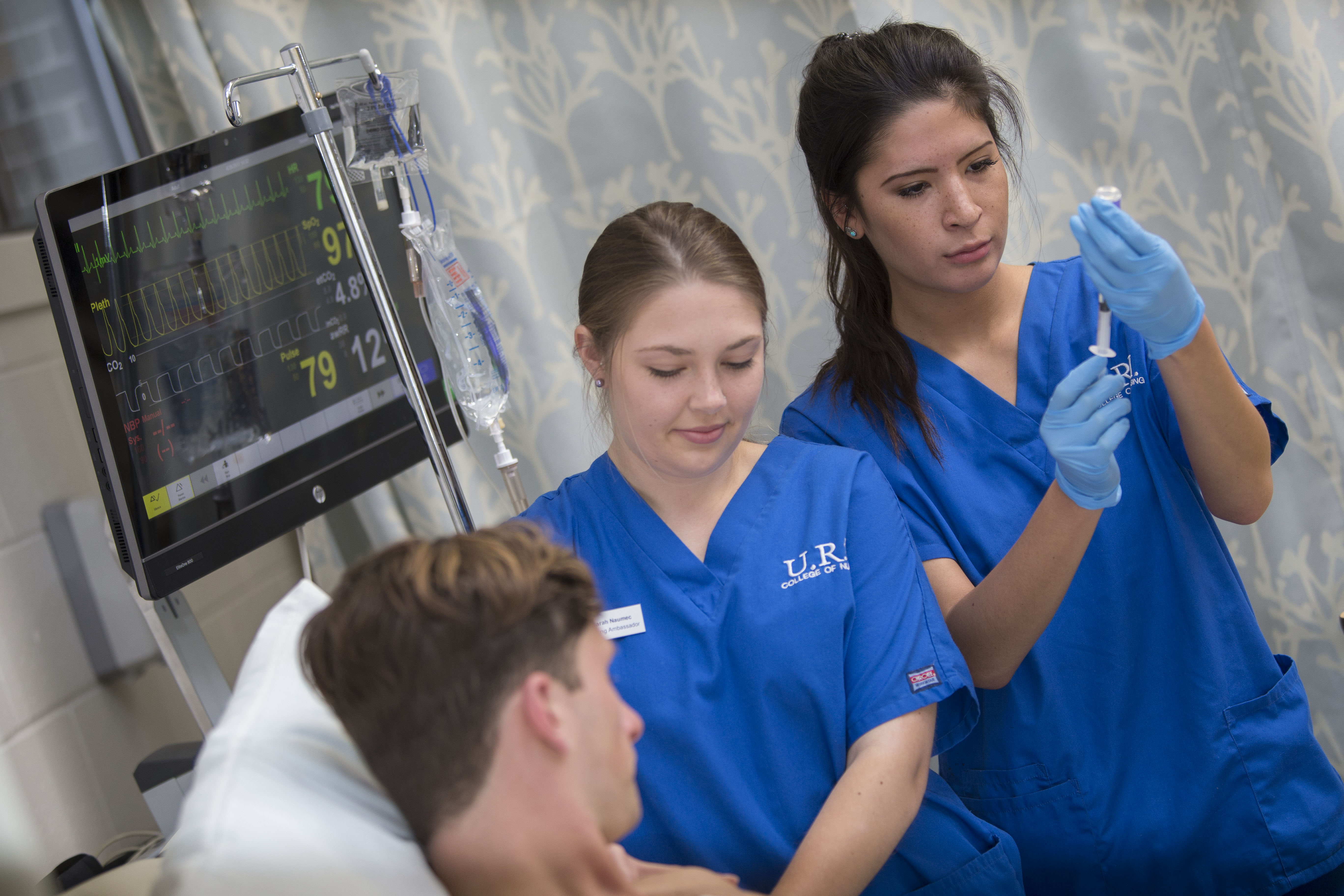 Nursing students providing care